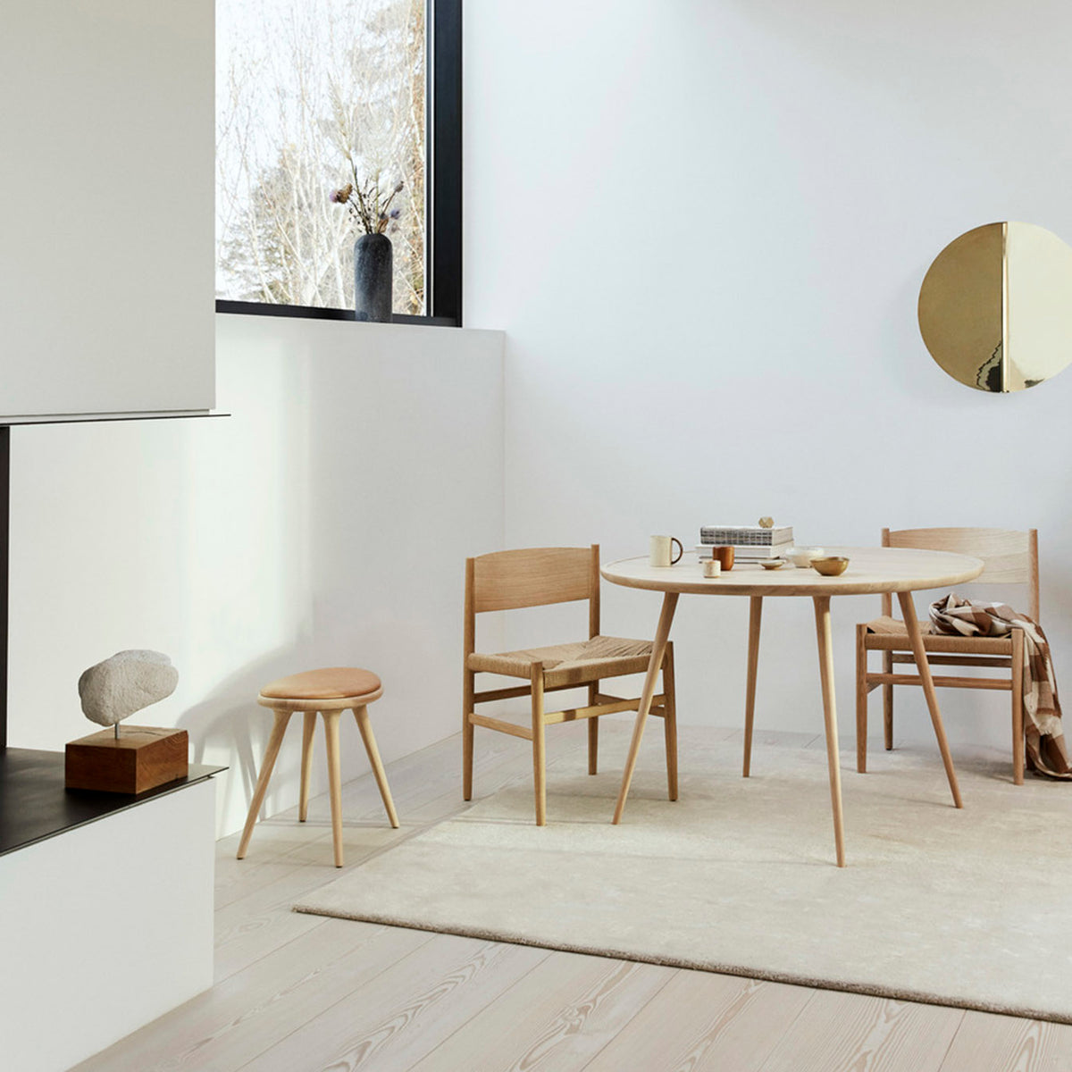 Nestor Sidechair in Matt Lacquered Oak with paper cord seat, in an interior setting