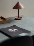 Mater Desktop in Coffee Waste Soft Black, setting in a workspace