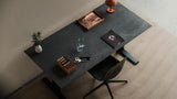 Mater Desktop in Coffee Waste Soft Black, setting in a home office
